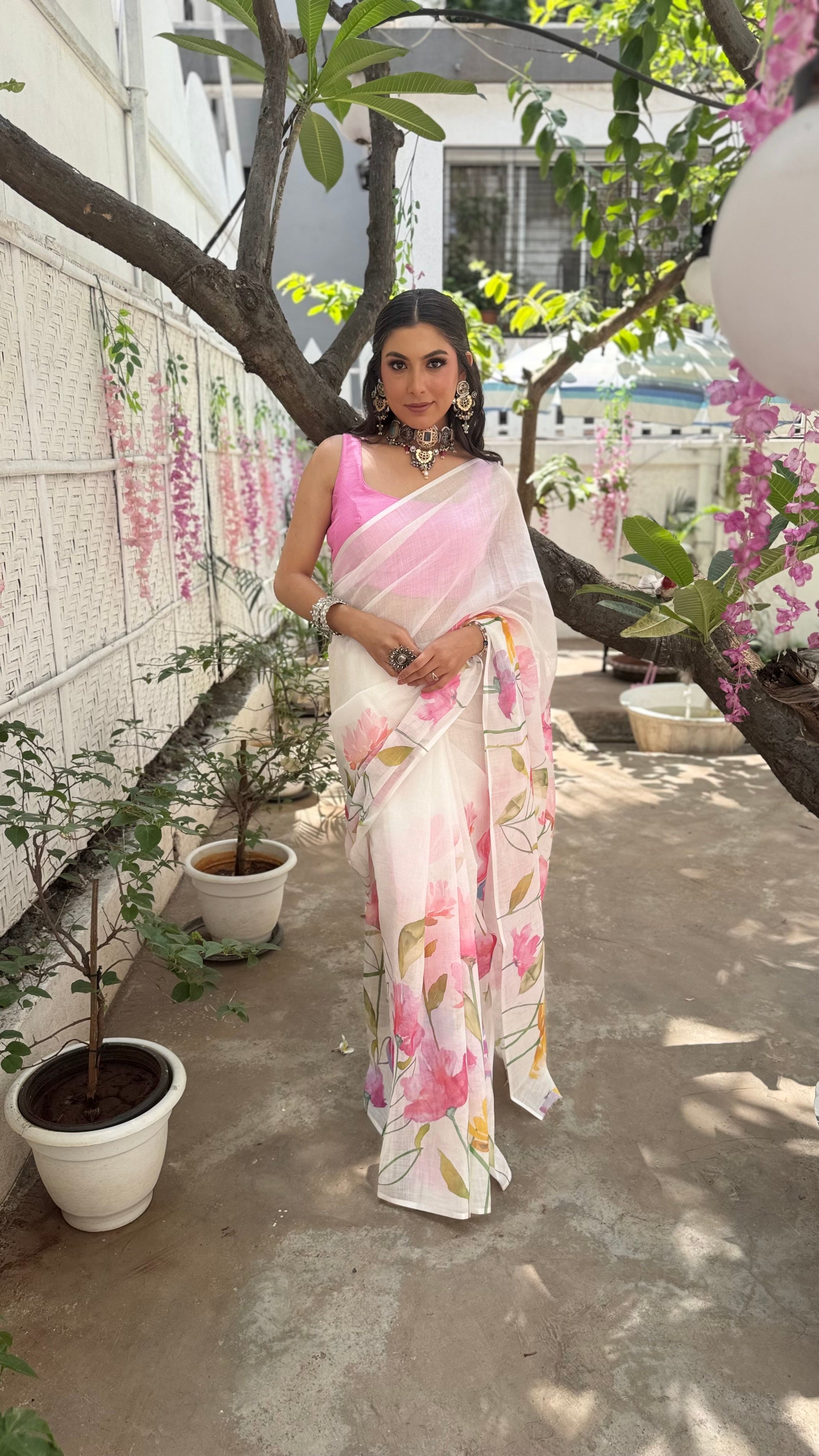Model wearing designer cotton multicolour floral saree for daily wear
